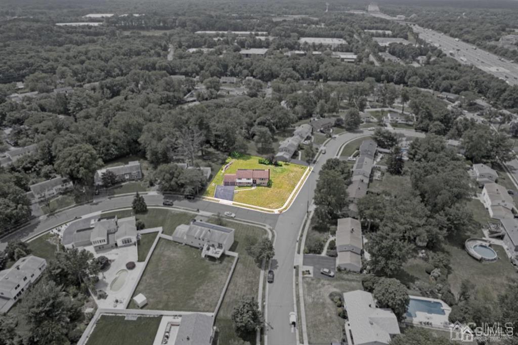 23 Vauxhall Road East Brunswick, NJ 08816 - Photo 7 of 28 an aerial view of a house with outdoor space