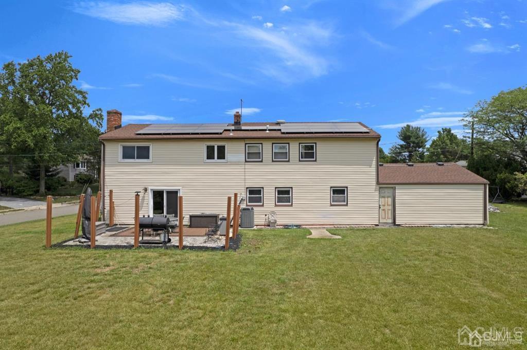23 Vauxhall Road East Brunswick, NJ 08816 - Photo 10 of 28 a front view of house with yard and seating area