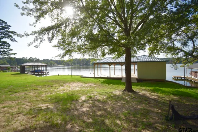 a view of outdoor space with deck and backyard