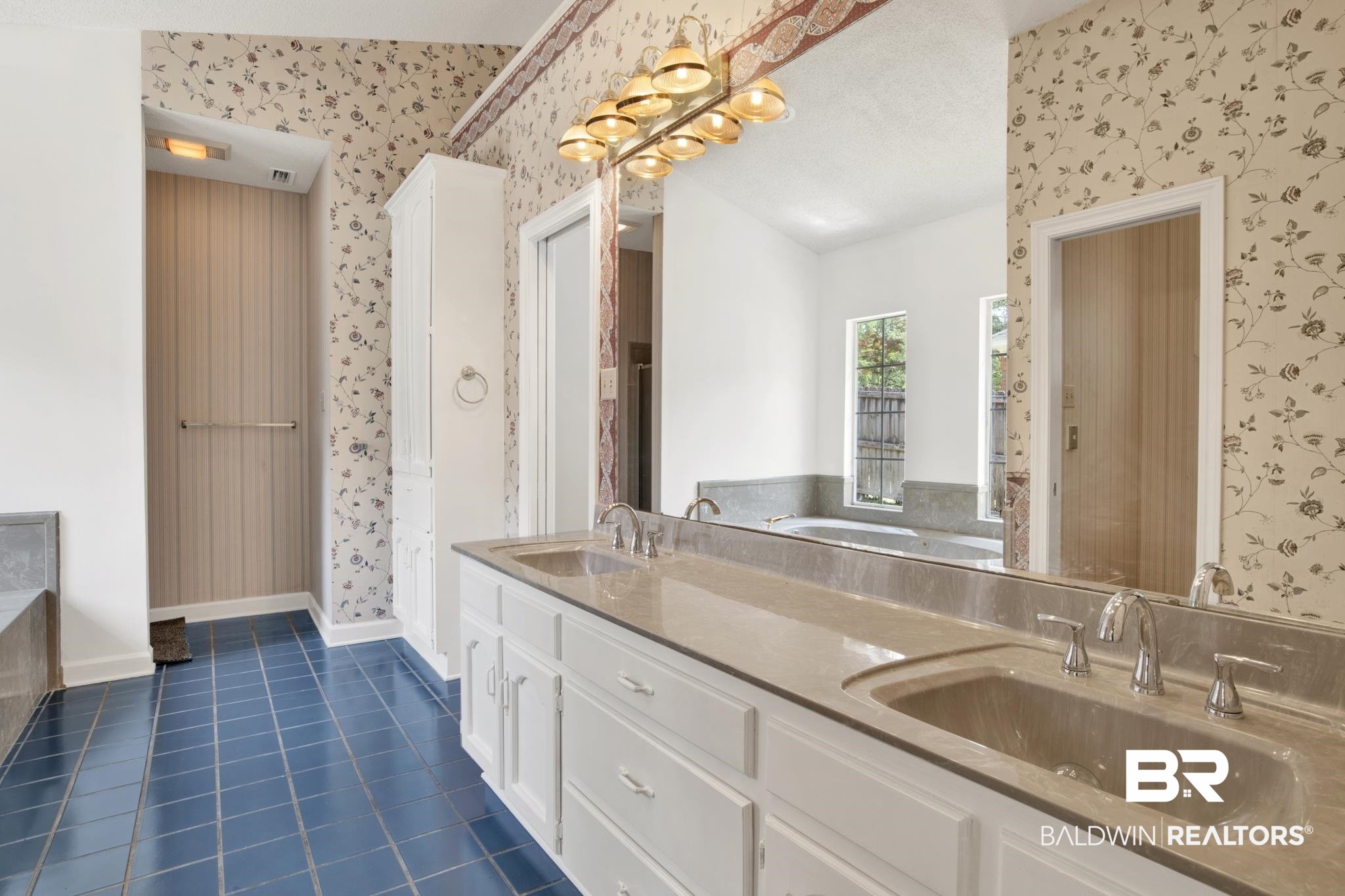 6805 Hunters Court Mobile, AL 36695 - Photo 20 of 37 Bathroom featuring wallpapered walls, double vanity, a garden tub, tile patterned flooring, and baseboards
