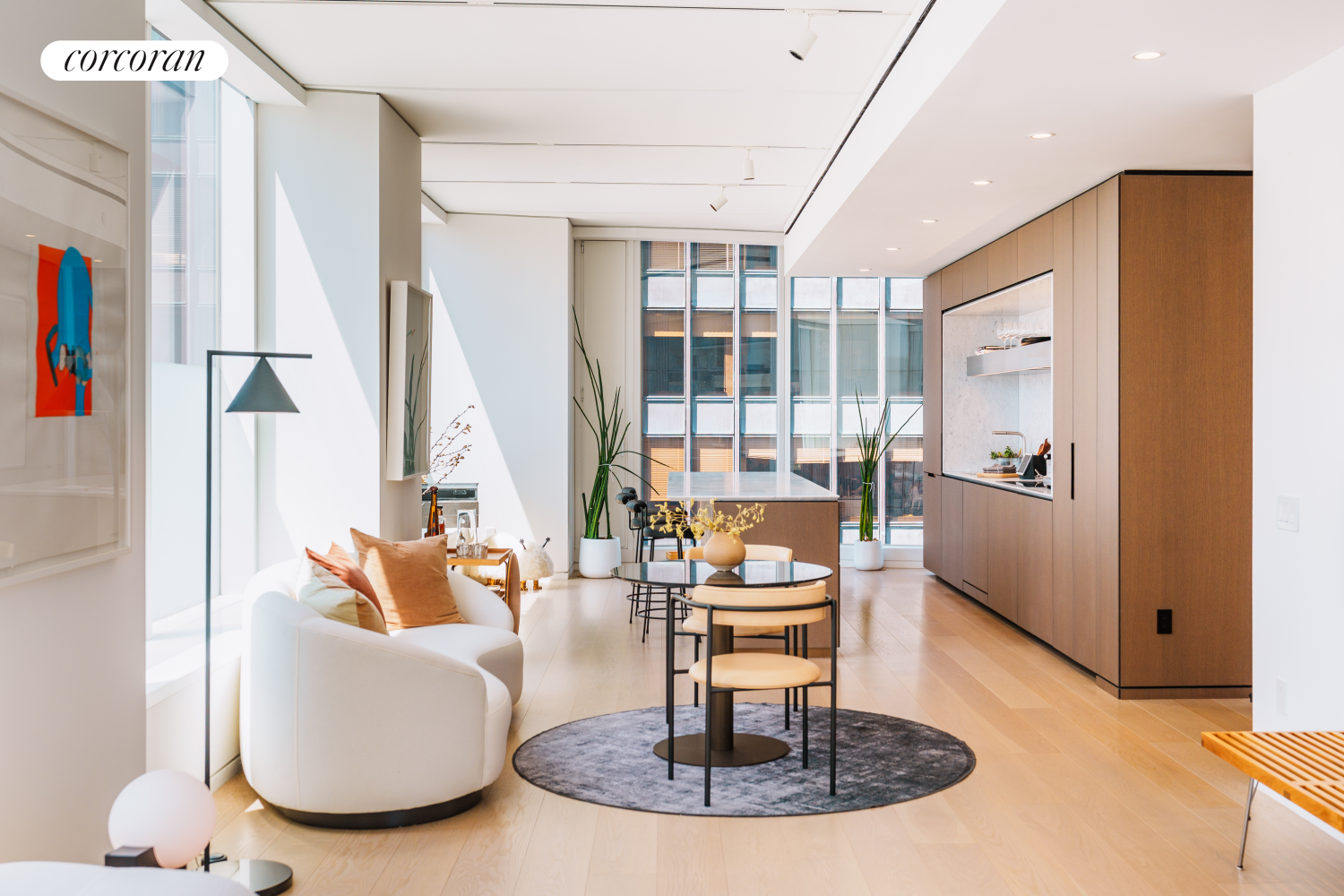 100 East 53rd Street, Unit 41B Manhattan, NY 10022 - Photo 9 of 25 a living room with furniture and a fireplace