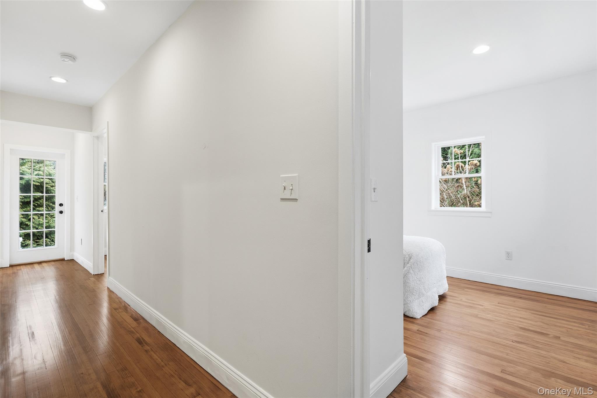 56 Huntville Road Katonah, NY 10536 - Photo 17 of 44 Hallway to 2 Bedrooms, Walk in closet, Full Bath, and door to back patio.