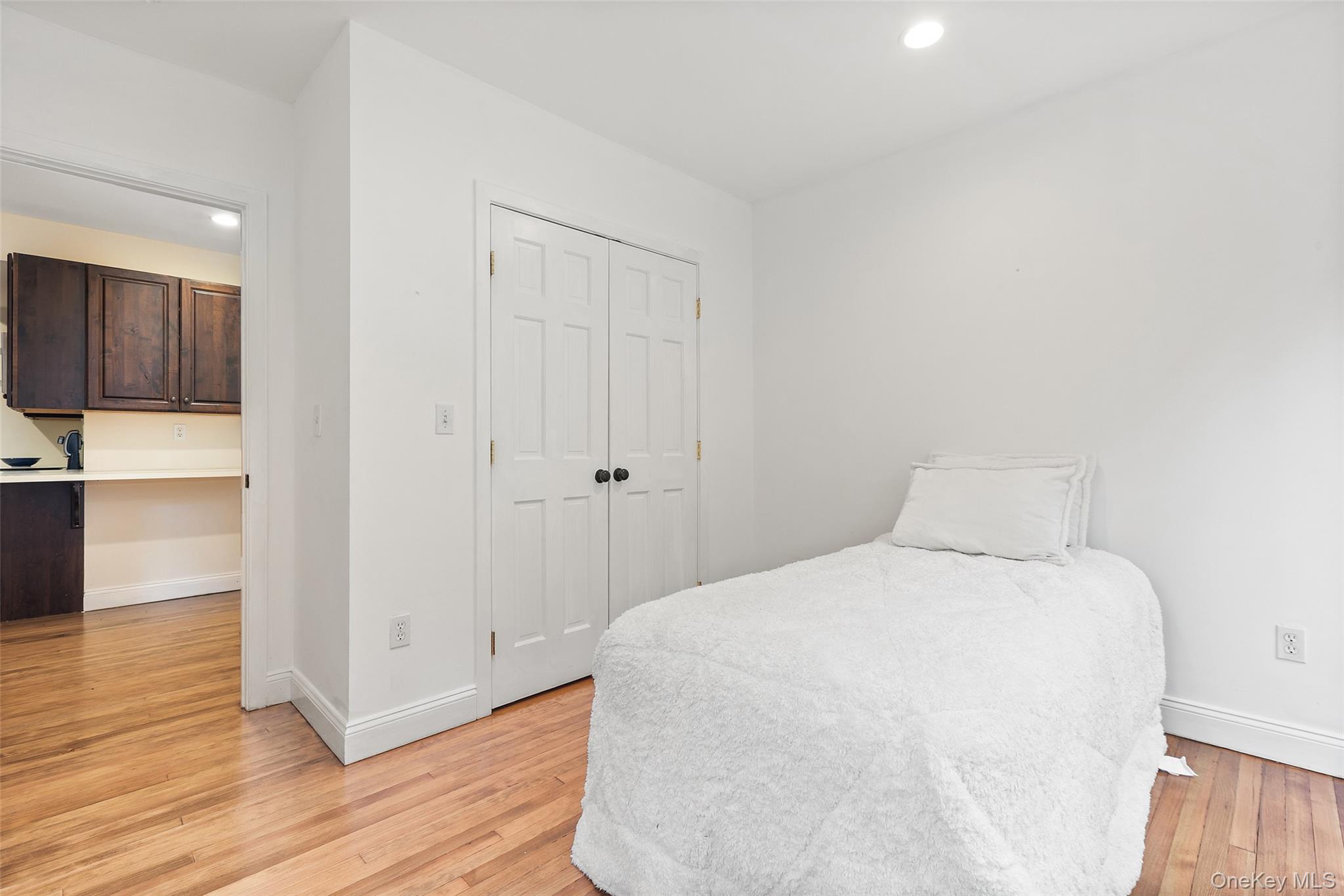 56 Huntville Road Katonah, NY 10536 - Photo 20 of 44 Bedroom with double closet and door to stone patio