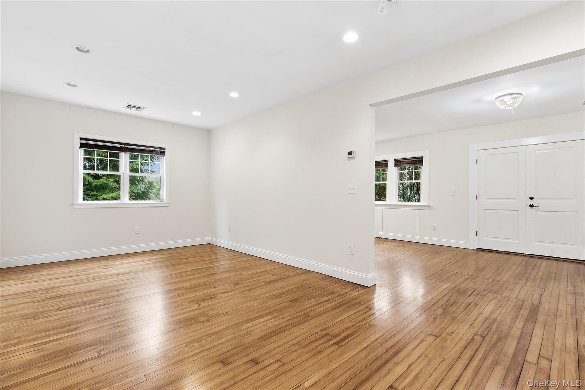 56 Huntville Road Katonah, NY 10536 - Photo 4 of 44 View from Library/Sitting Room to Dining area and Front door/Entry and Living Room