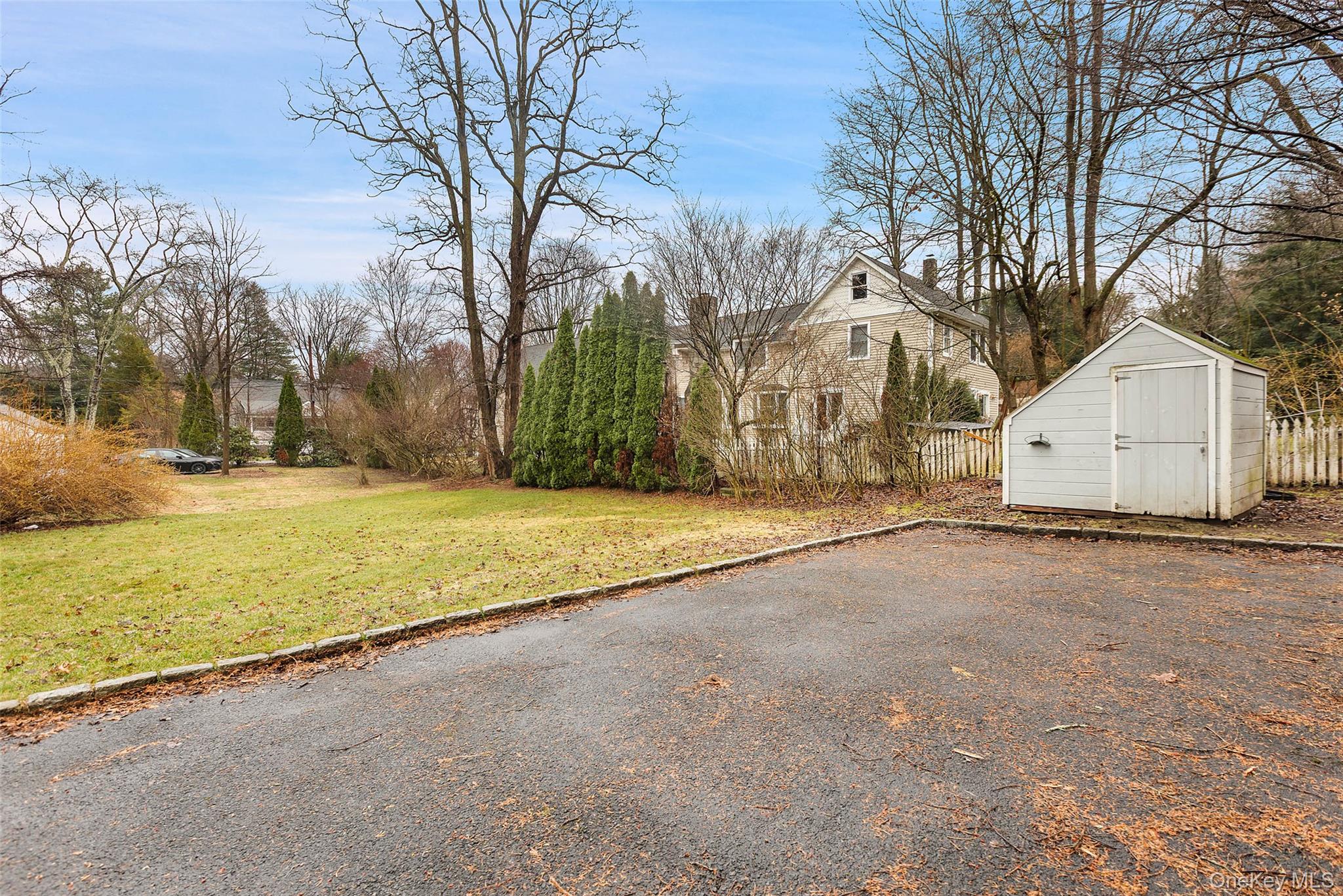 56 Huntville Road Katonah, NY 10536 - Photo 42 of 44 Driveway, shed and backyard.