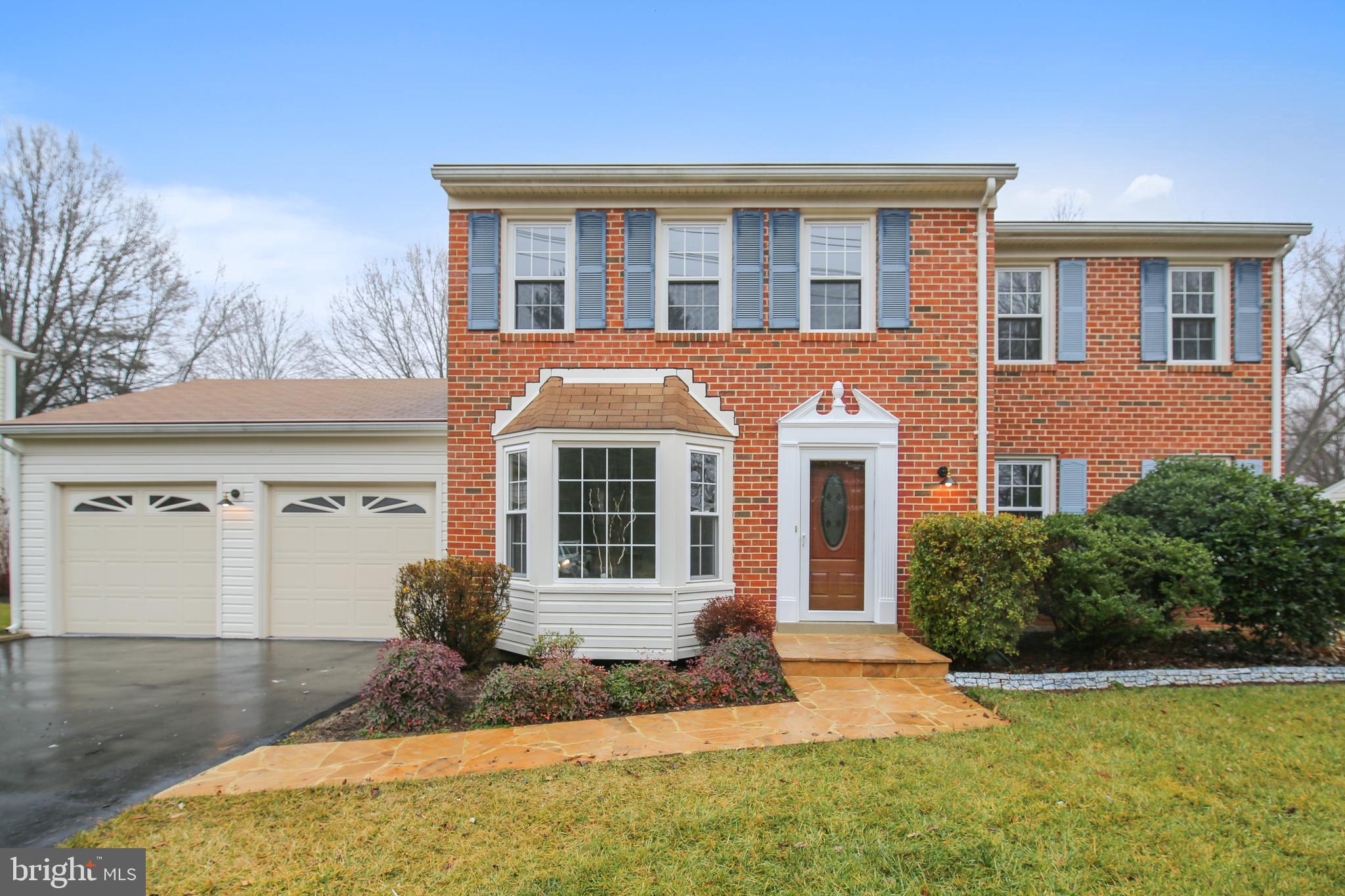4238 Briars Road Olney, MD 20832 - Photo 1 of 44 a front view of a house with a yard