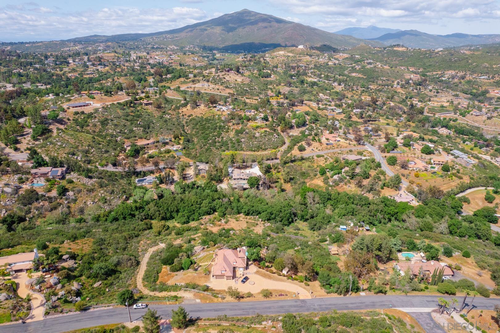 0 Via Viejas Oeste Alpine, CA 91901 - Photo 19 of 36 an aerial view of residential houses with outdoor space and trees