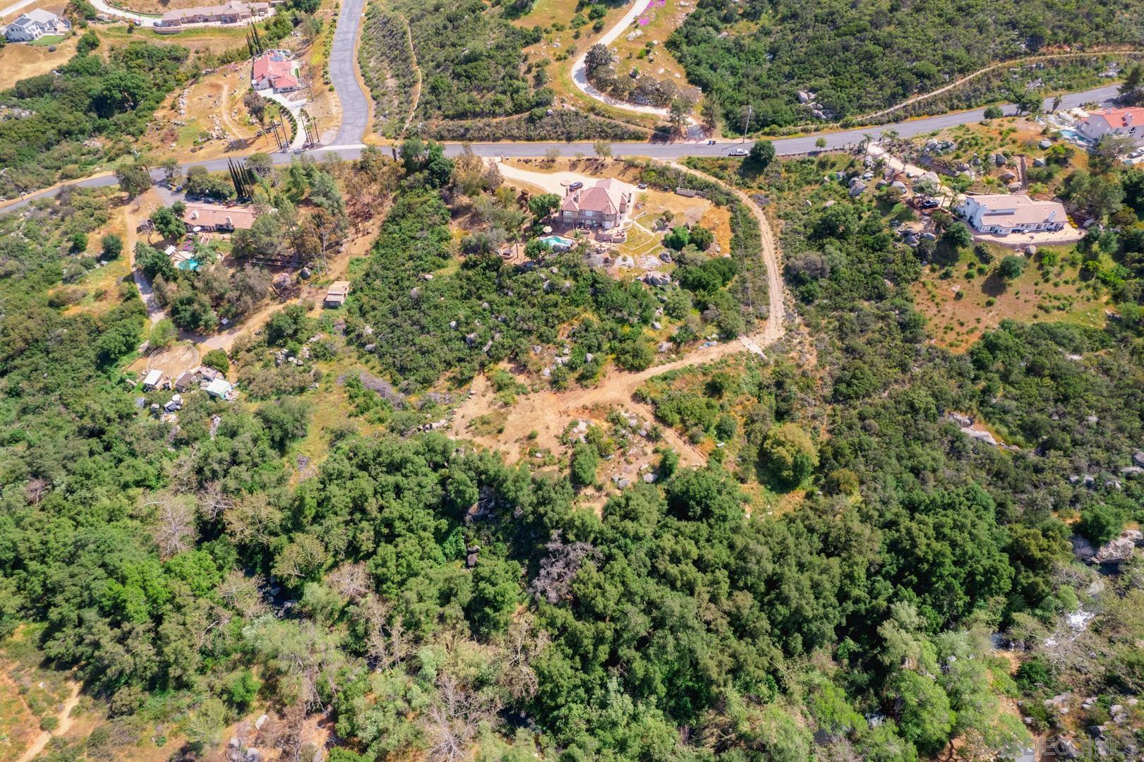 0 Via Viejas Oeste Alpine, CA 91901 - Photo 22 of 36 an aerial view of residential house with outdoor space and trees all around