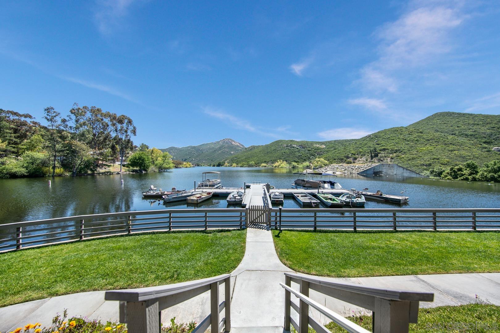 0 Via Viejas Oeste Alpine, CA 91901 - Photo 6 of 36 a view of a lake with a house in the background