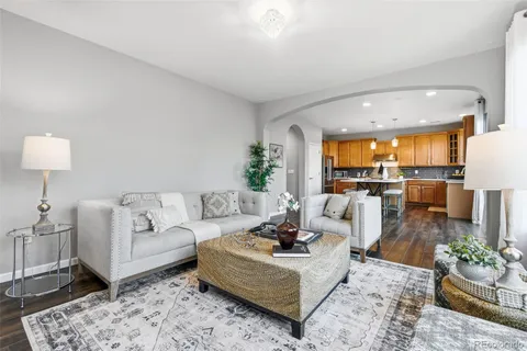 a view of a dining room with a table and chairs