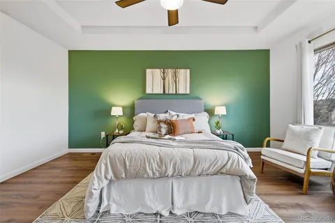 a bath tub sitting in a bathroom next to a window
