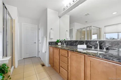 a workspace with furniture and a chandelier fan