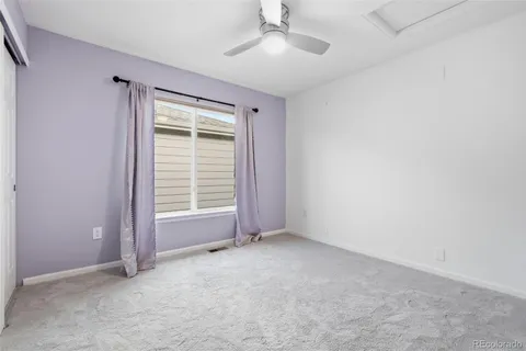 an aerial view of a house with a lake view