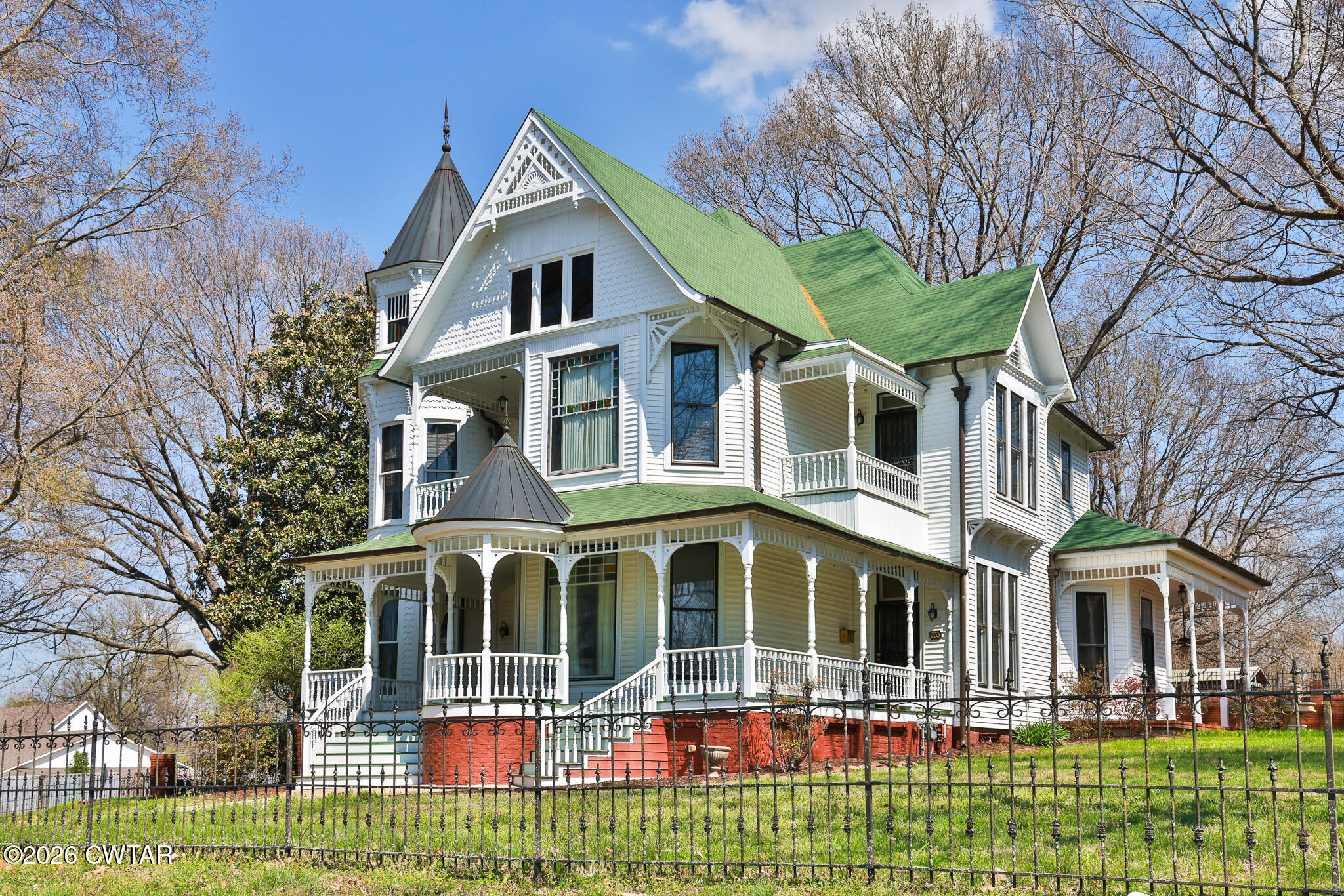 203 North McCombs Street Martin, TN 38237 - Photo 1 of 37 a front view of a house with garden