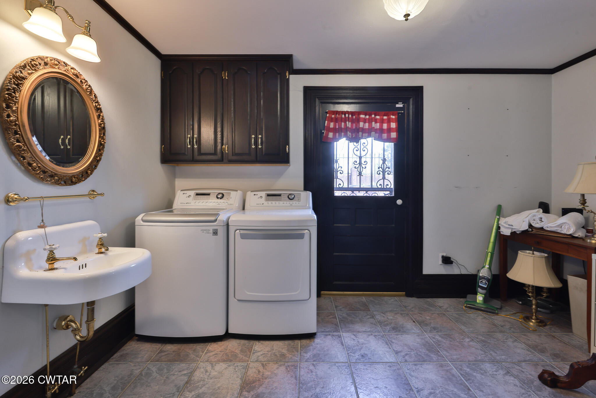 203 North McCombs Street Martin, TN 38237 - Photo 12 of 37 a utility room with dryer and washer