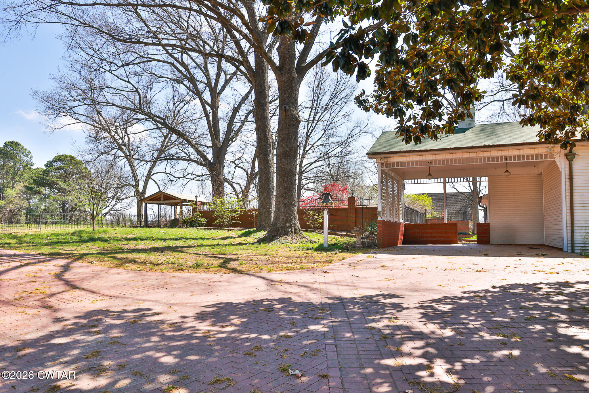 203 North McCombs Street Martin, TN 38237 - Photo 21 of 37 a view of a house with a yard