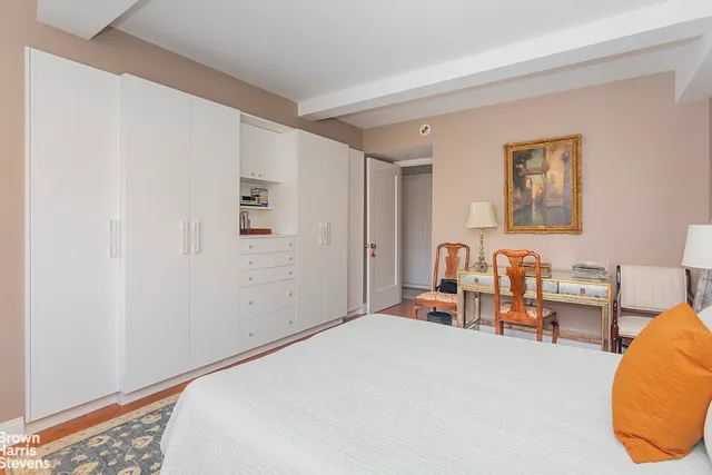 a bedroom with a bed and furniture