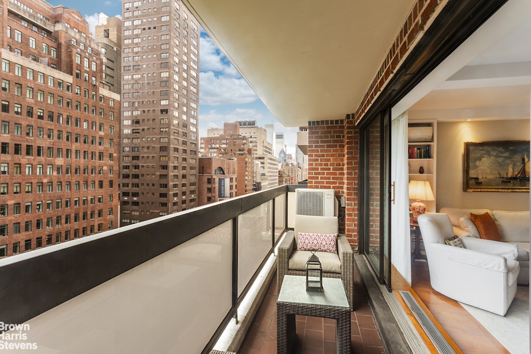 750 Park Avenue, Unit 12B Manhattan, NY 10021 - Photo 8 of 10 a view of balcony with furniture