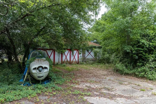 a view of a lake with green space