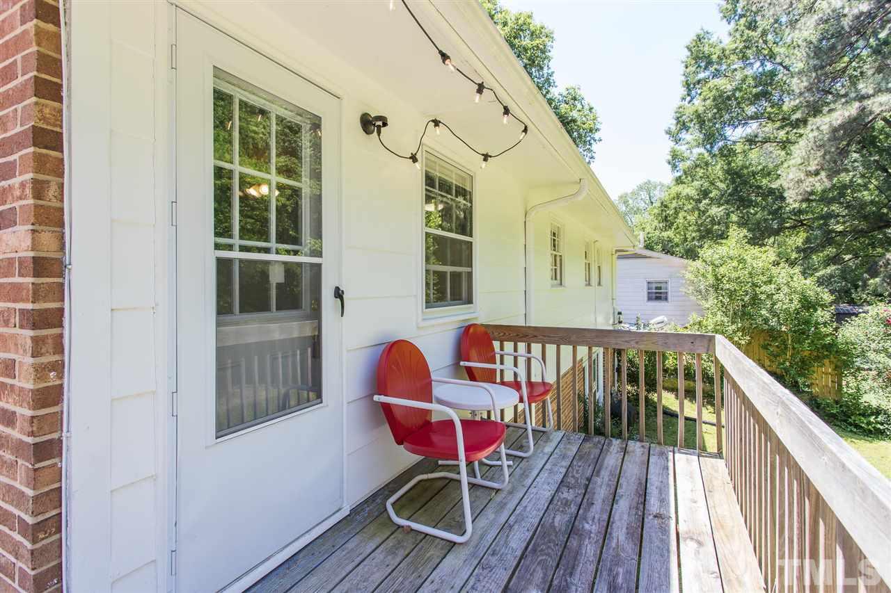 812 Cooper Road Raleigh, NC 27610 - Photo 14 of 29 And relaxing on the deck