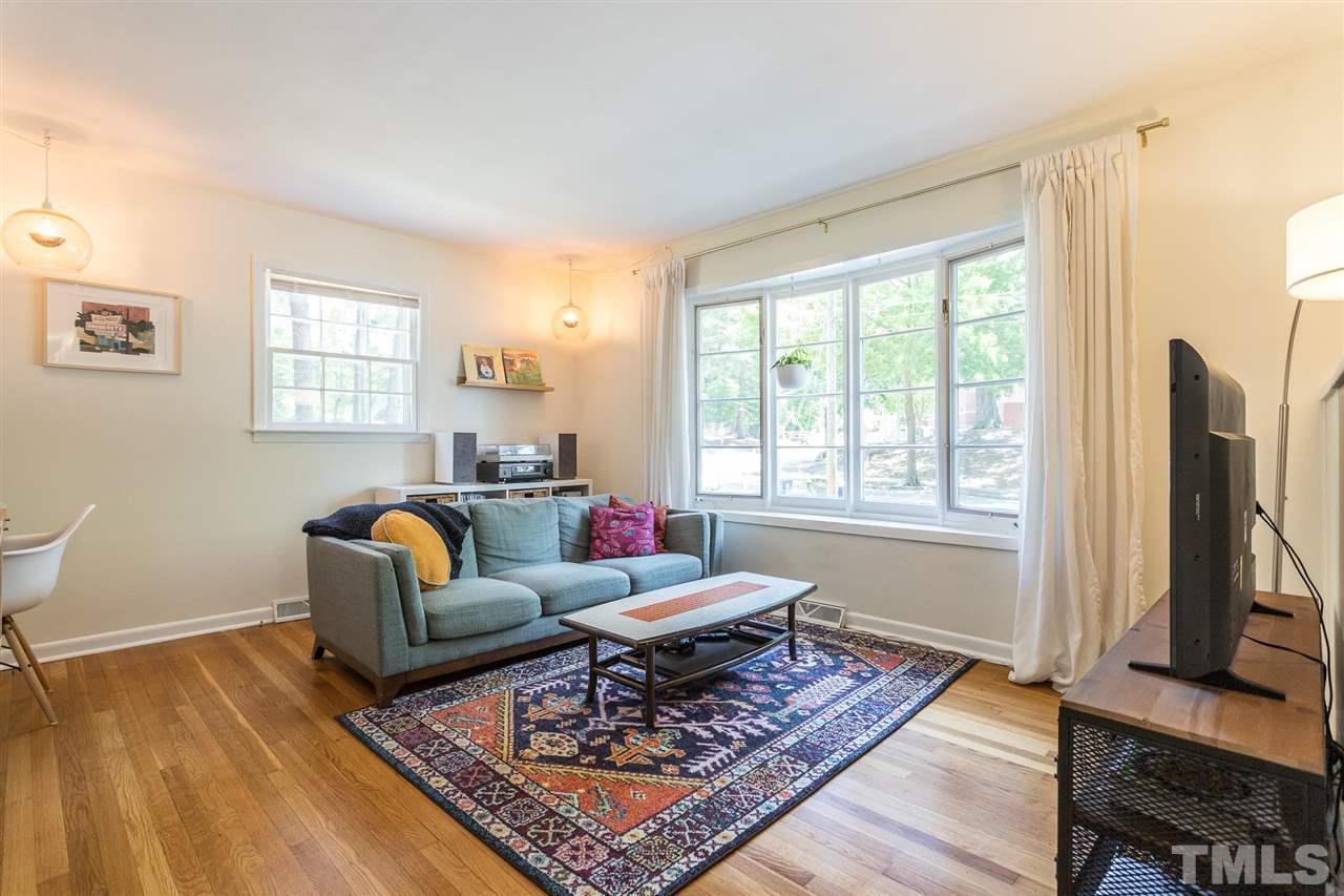812 Cooper Road Raleigh, NC 27610 - Photo 3 of 29 The bay window brightens the living room