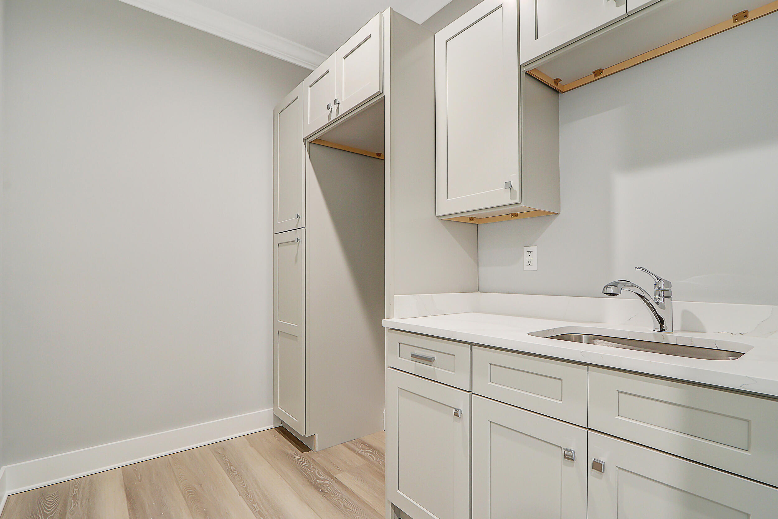 4629 Southeast Manatee Lane Stuart, FL 34997 - Photo 25 of 31 a bathroom with a sink and a mirror