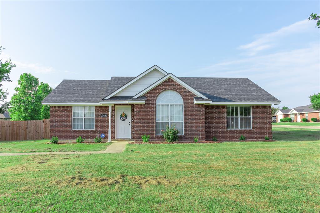 706 Aldridge Street Commerce, TX 75428 - Photo 1 of 1 a front view of house with yard and green space