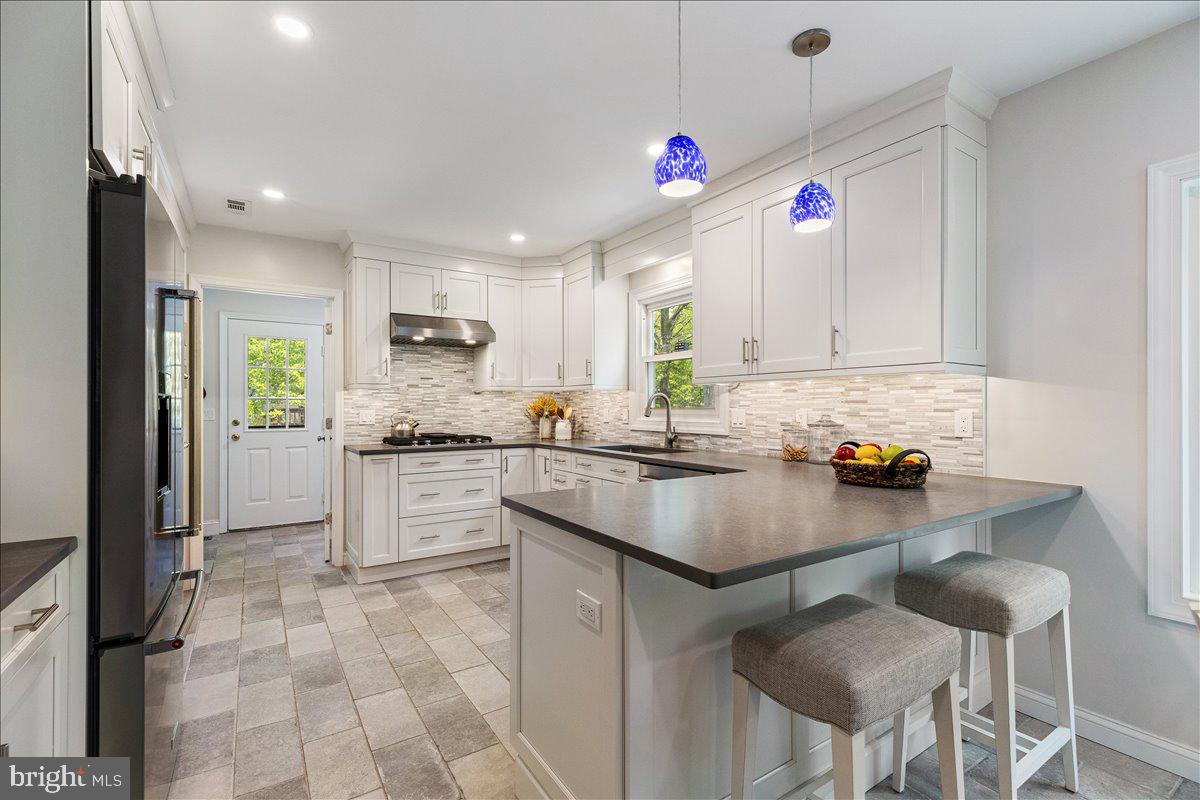 3 Strathmore Place Princeton Junction, NJ 08550 - Photo 7 of 29 a kitchen with a sink cabinets and window