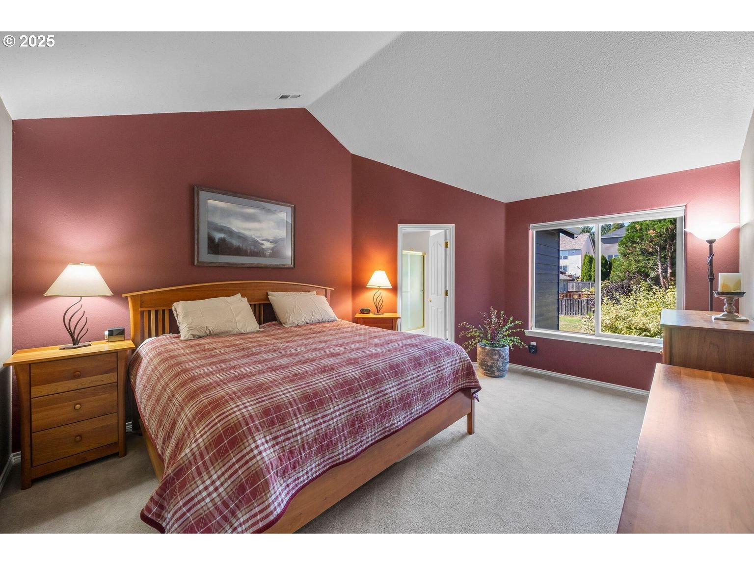 14941 Northwest Wendy Lane Portland, OR 97229 - Photo 13 of 26 a bedroom with a bed and a couch