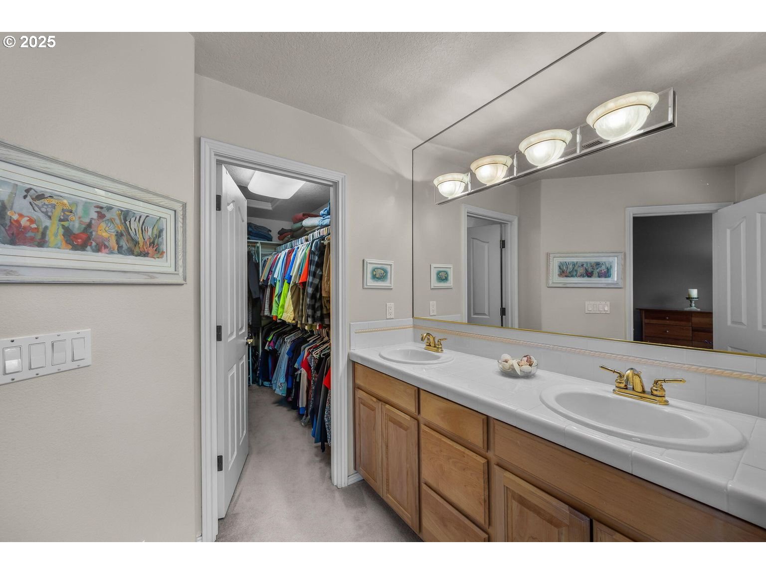 14941 Northwest Wendy Lane Portland, OR 97229 - Photo 17 of 26 a bathroom with a sink vanity and a mirror