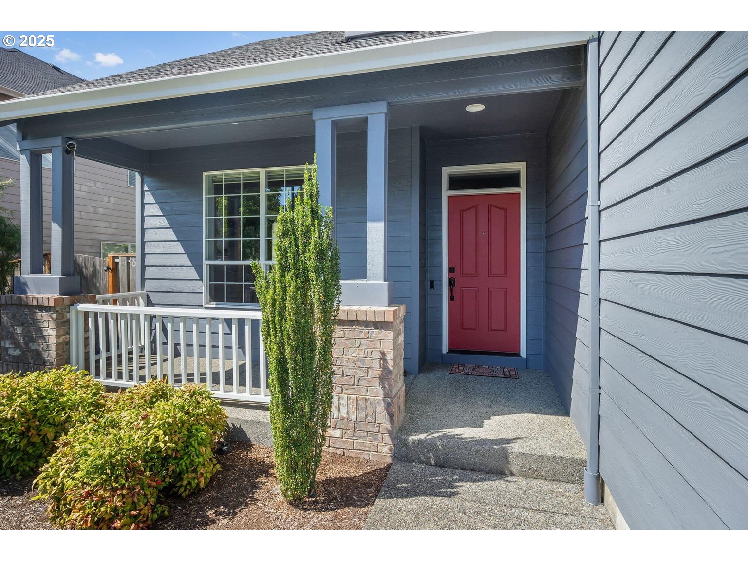 14941 Northwest Wendy Lane Portland, OR 97229 - Photo 2 of 26 a picture of a door and a bench