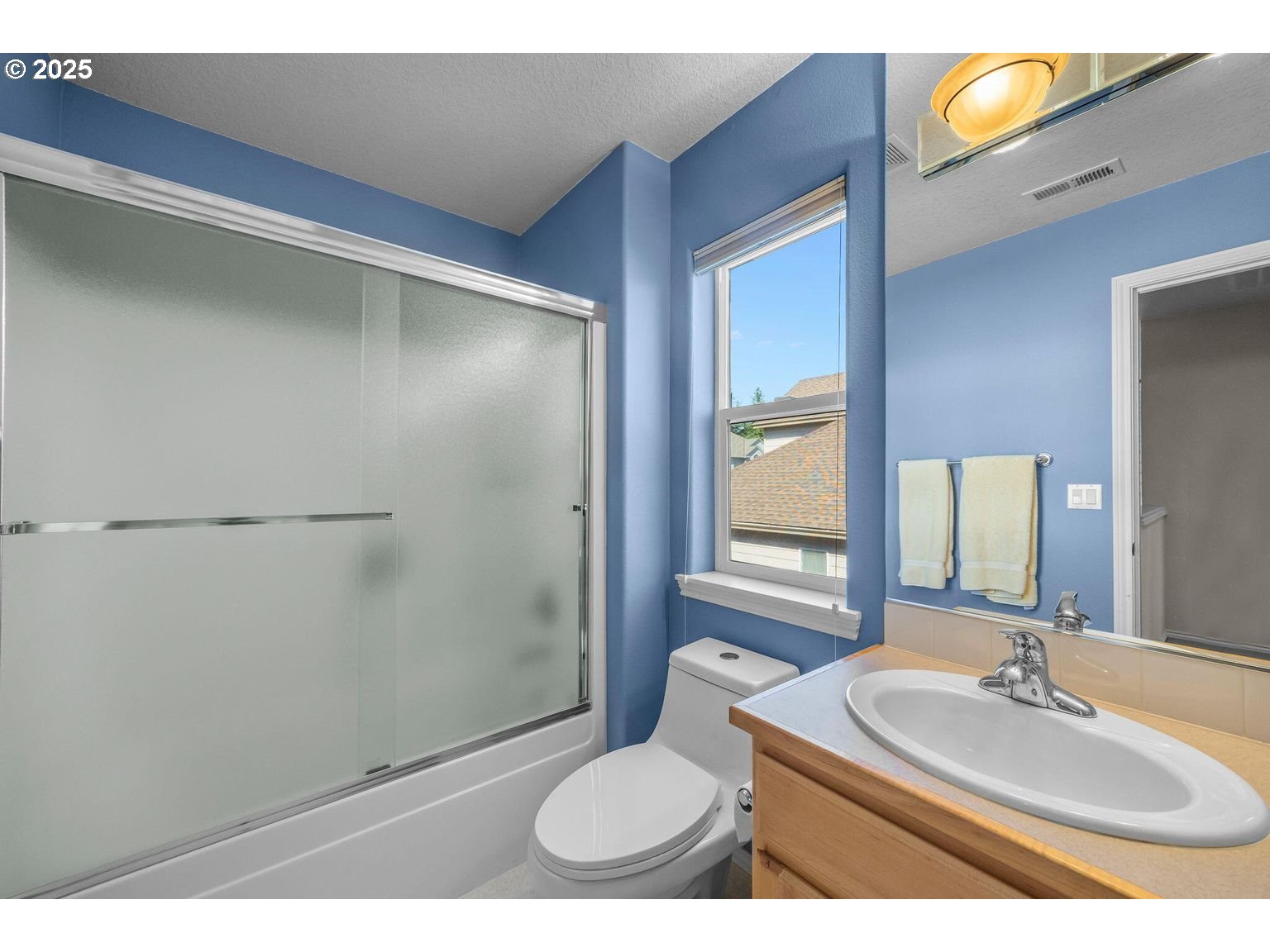 14941 Northwest Wendy Lane Portland, OR 97229 - Photo 21 of 26 a bathroom with a sink toilet and shower