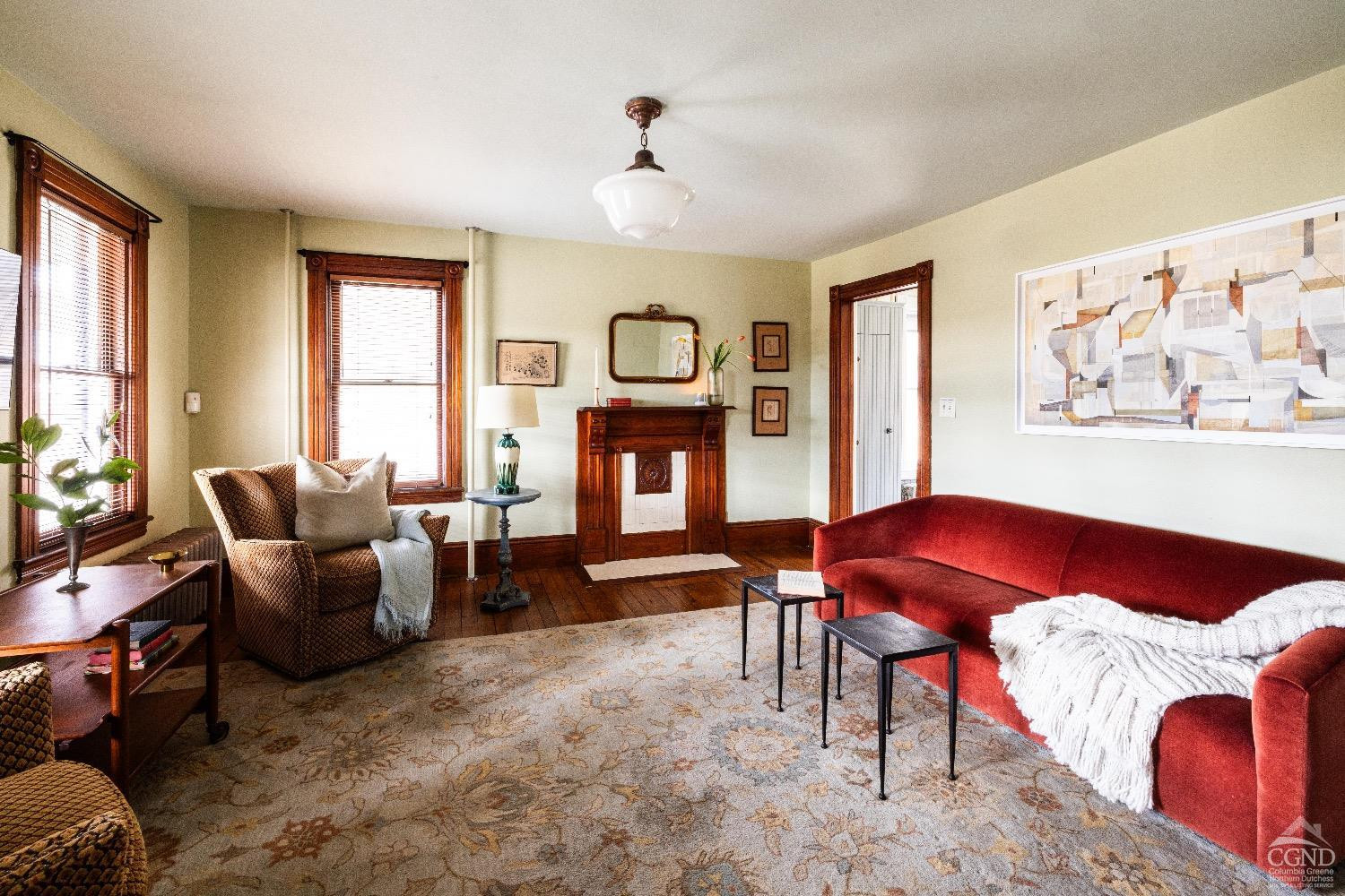 1301 Co Rte 7 Ancram, NY 12502 - Photo 12 of 52 a living room with furniture and a large window