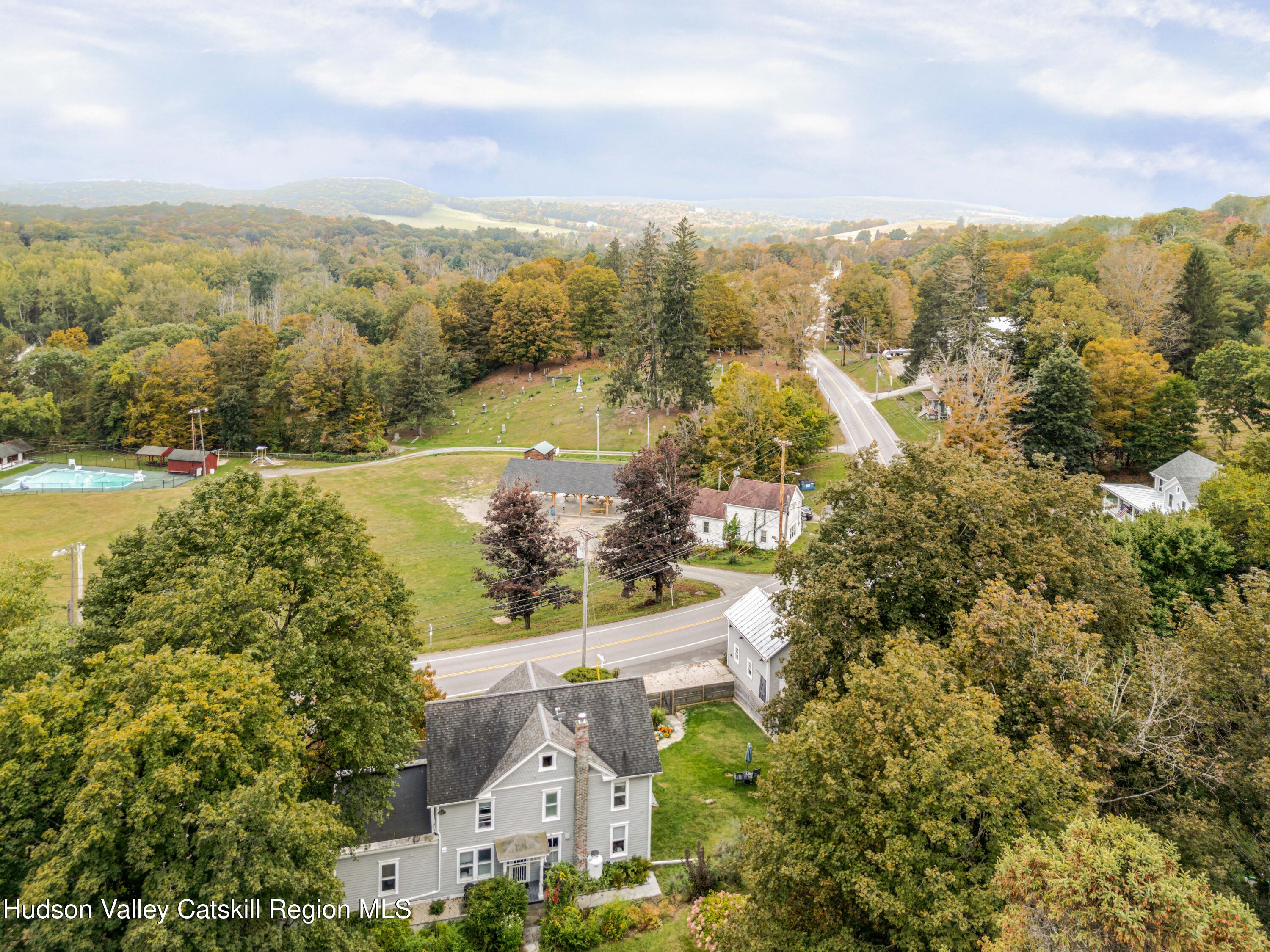 1301 Co Rte 7 Ancram, NY 12502 - Photo 2 of 52 an aerial view of residential building with outdoor space and lake view
