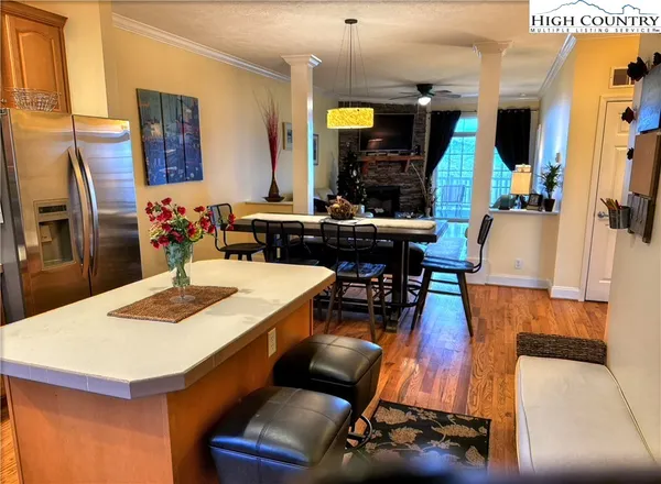 a view of kitchen dining table and chairs