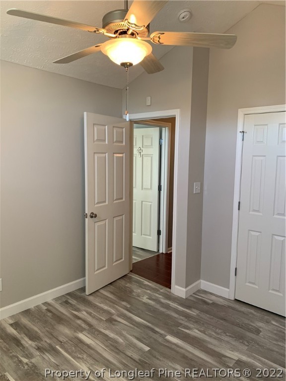 5428 Arnette Road Hope Mills, NC 28348 - Photo 11 of 41 a view of a livingroom with a chandelier fan and windows