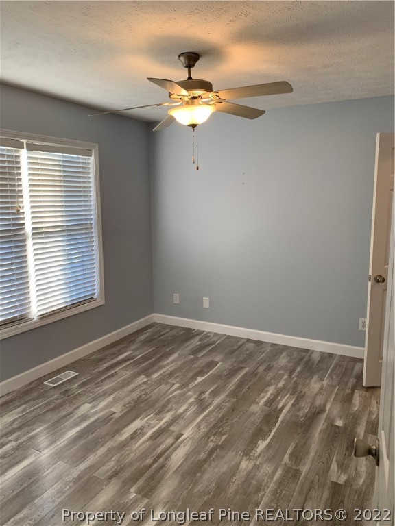 5428 Arnette Road Hope Mills, NC 28348 - Photo 15 of 41 a view of a room with a ceiling fan and window