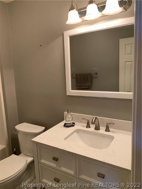5428 Arnette Road Hope Mills, NC 28348 - Photo 16 of 41 a bathroom with a sink and a toilet