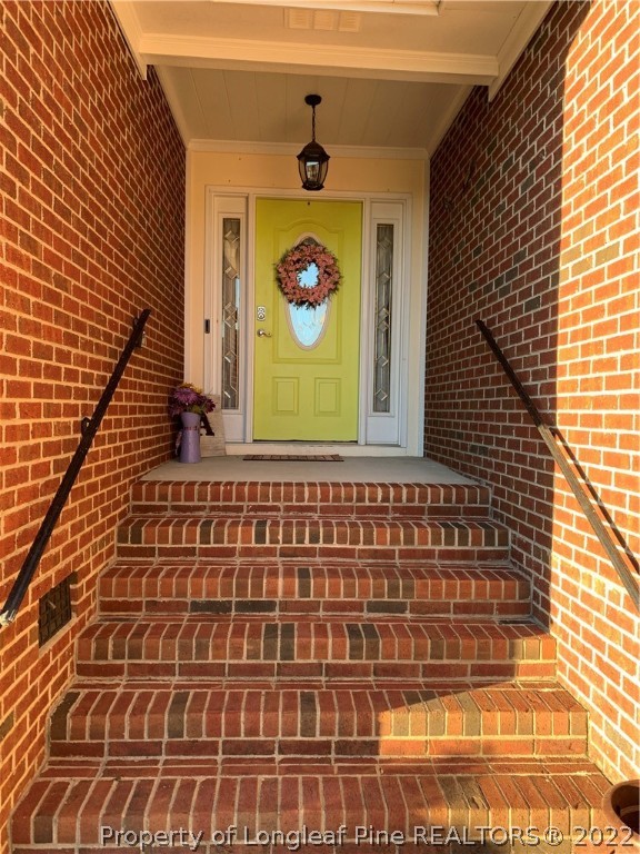 5428 Arnette Road Hope Mills, NC 28348 - Photo 3 of 41 a view of entrance door of the house