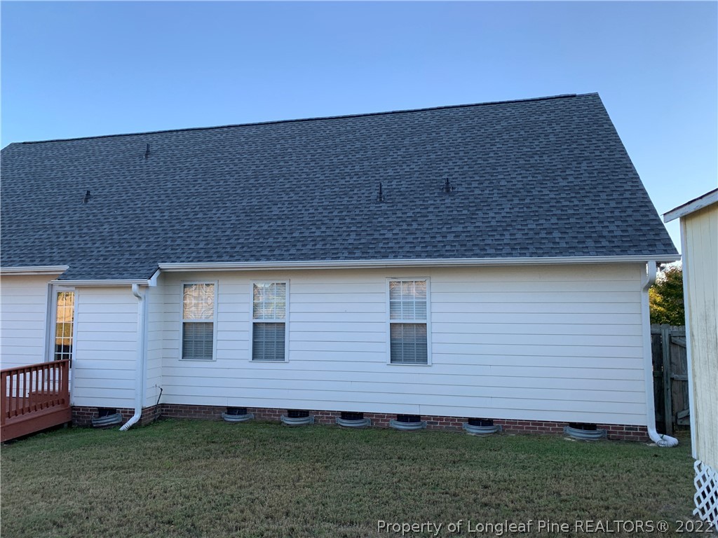 5428 Arnette Road Hope Mills, NC 28348 - Photo 7 of 41 a backyard of a house
