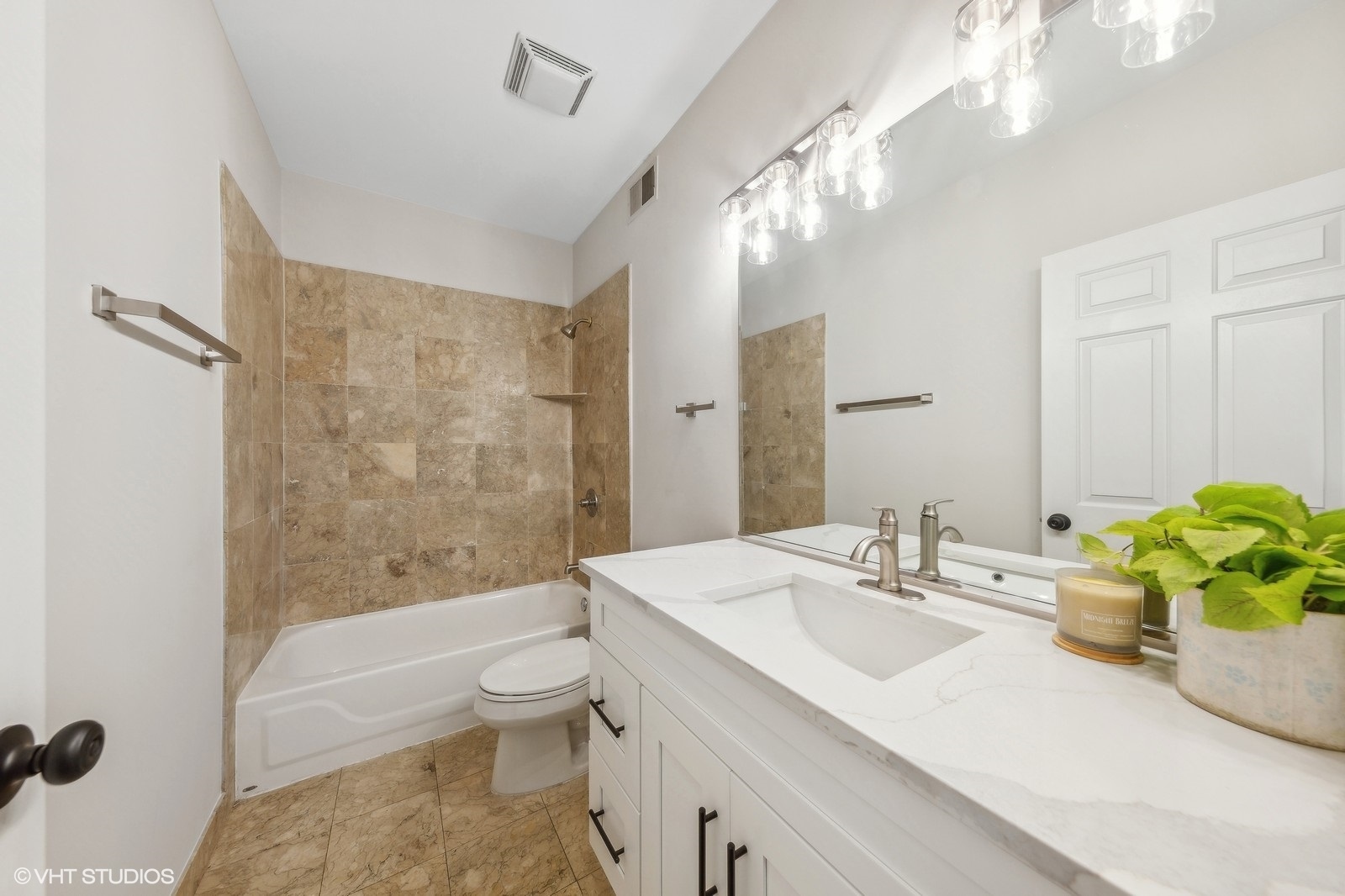 820 West Hubbard Street, Unit 4 Chicago, IL 60642 - Photo 23 of 28 a bathroom with a sink a toilet and shower