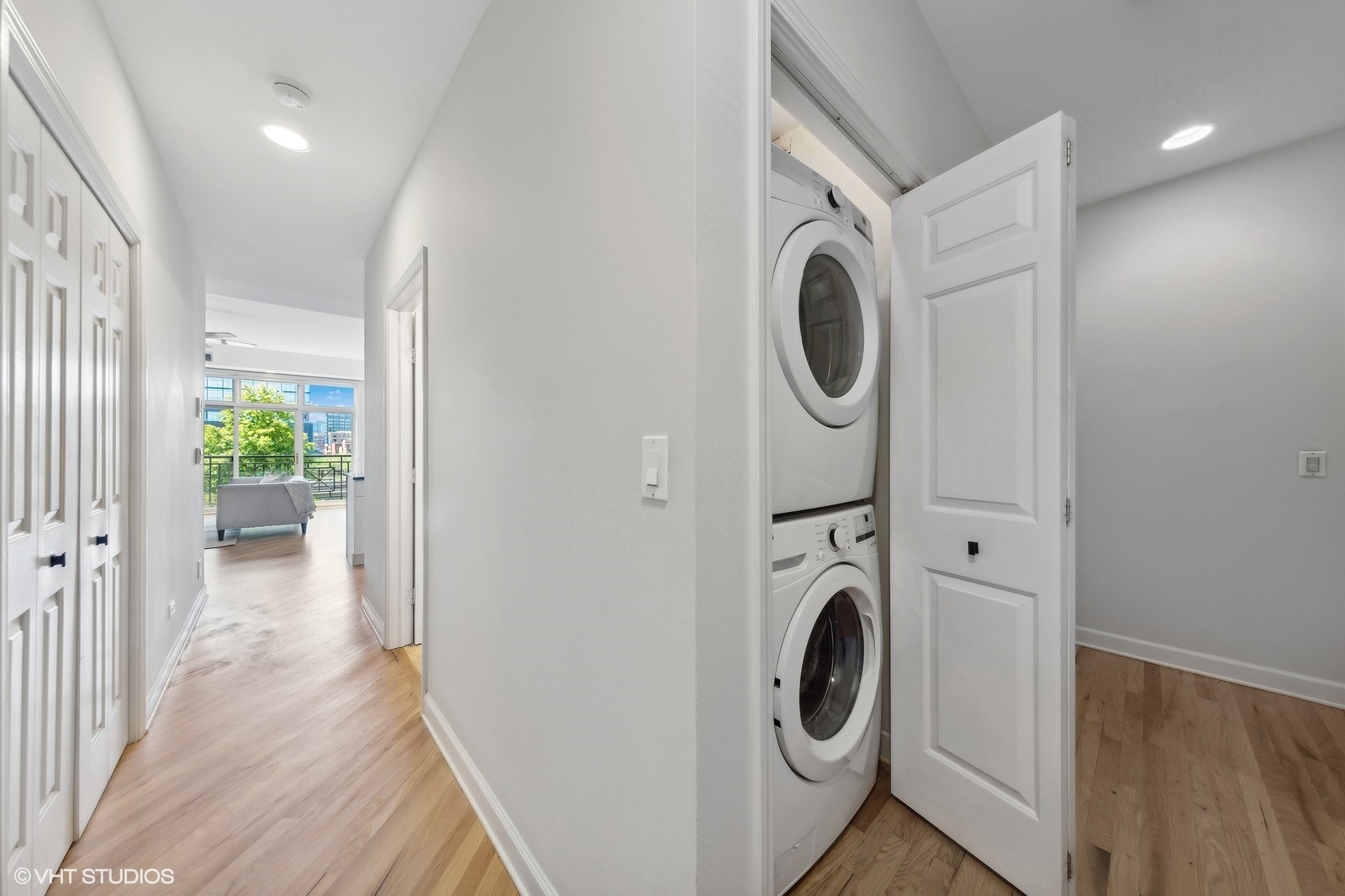 820 West Hubbard Street, Unit 4 Chicago, IL 60642 - Photo 24 of 28 a view of a hallway with washer and dryer