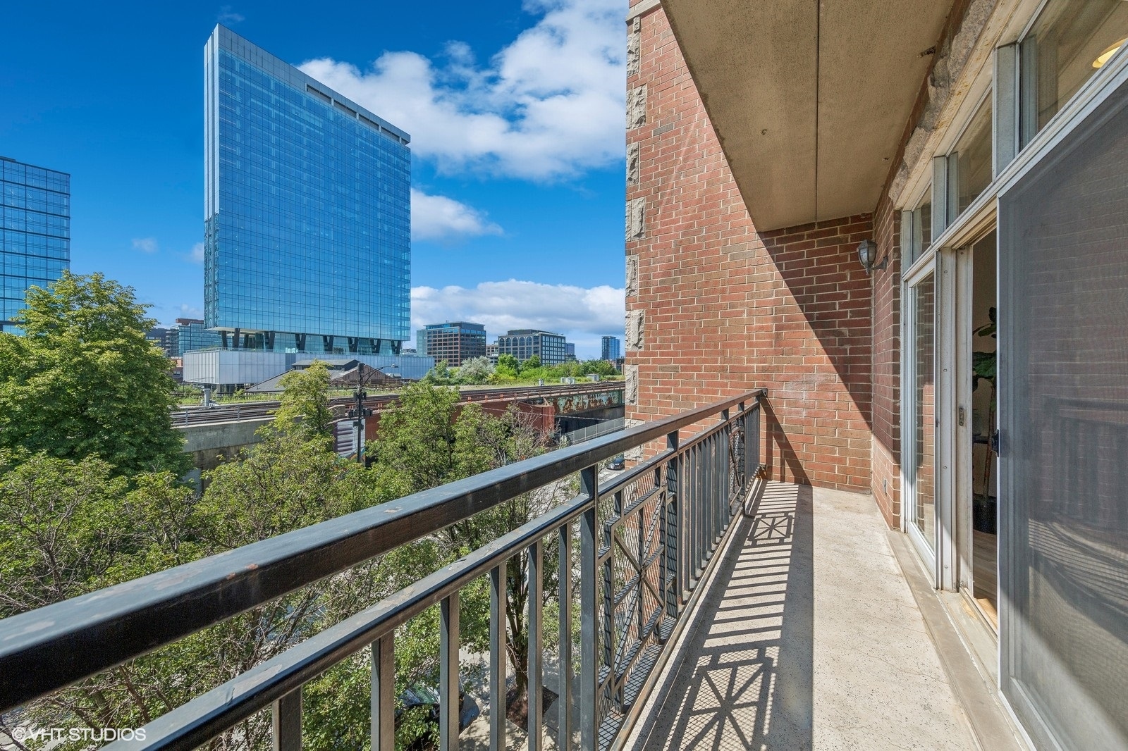 820 West Hubbard Street, Unit 4 Chicago, IL 60642 - Photo 27 of 28 a view of balcony with wooden floor