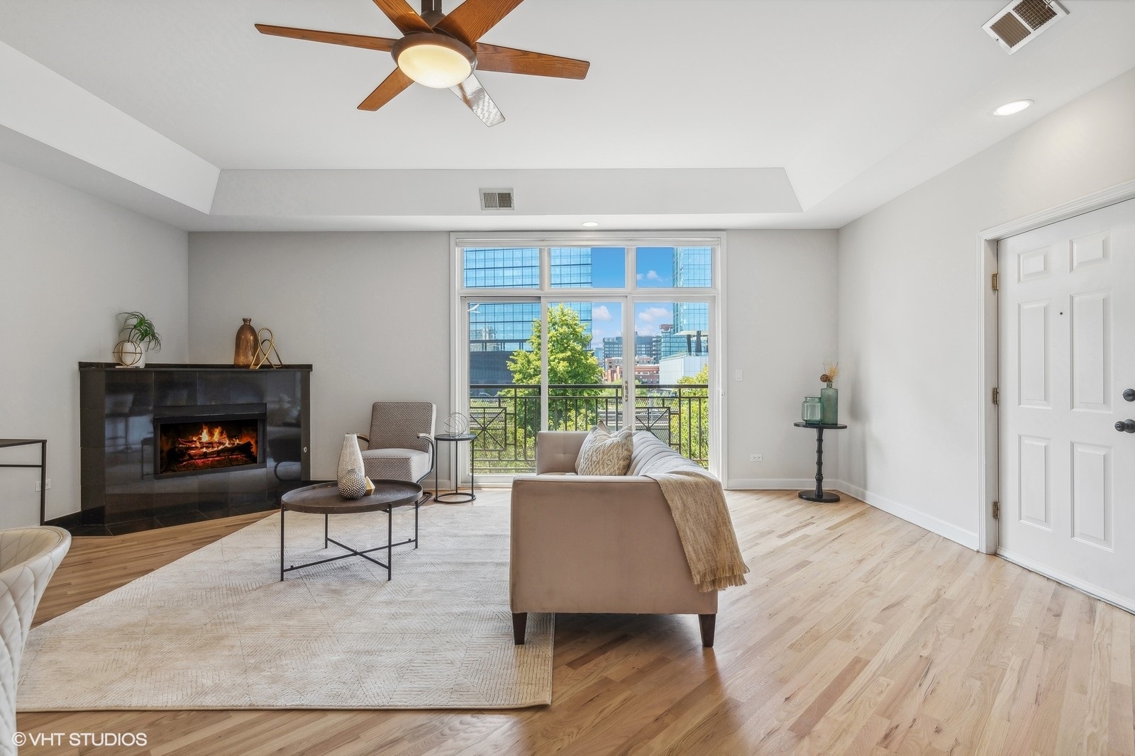 820 West Hubbard Street, Unit 4 Chicago, IL 60642 - Photo 8 of 28 a living room with furniture and a fireplace