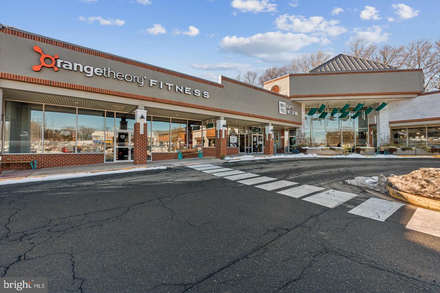 2106 Tysons Ridgeline Road Falls Church, VA 22043 - Photo 37 of 40 Vibrant fitness center in a lively plaza.