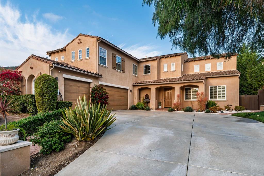 1459 Lighthouse Road San Marcos, CA 92078 - Photo 41 of 50 a front view of a house with a garden