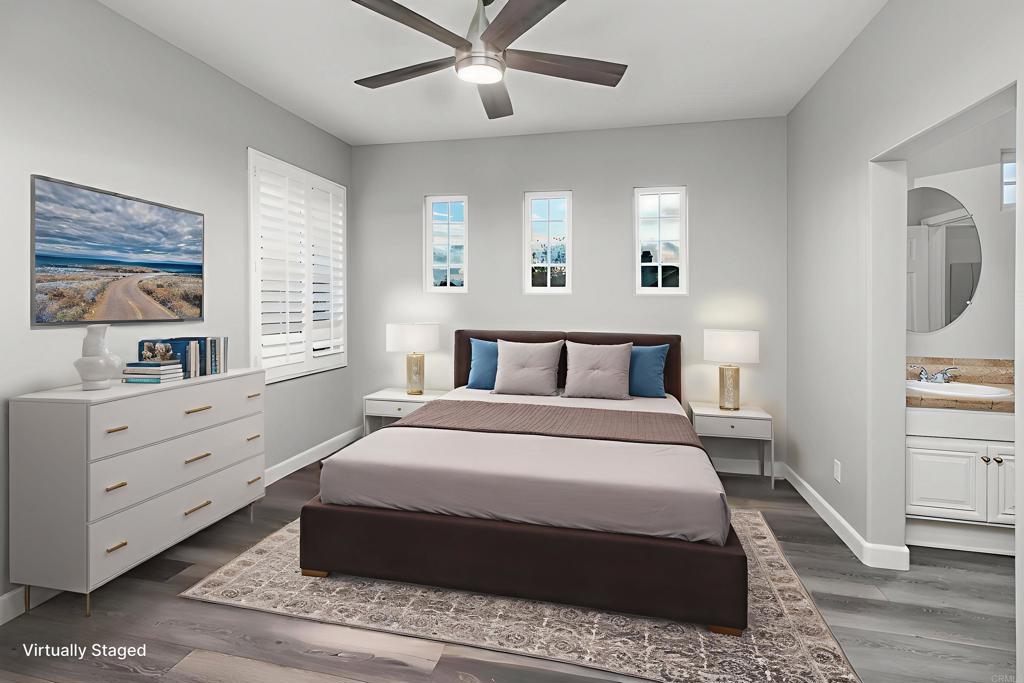 1459 Lighthouse Road San Marcos, CA 92078 - Photo 7 of 50 a spacious bedroom with a large bed and a window