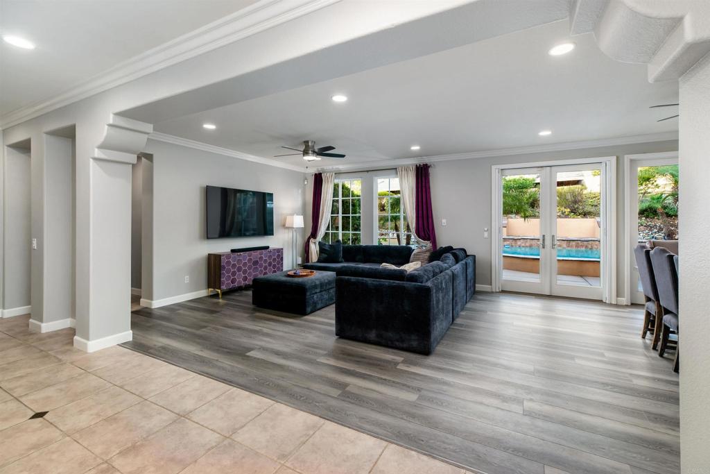 1459 Lighthouse Road San Marcos, CA 92078 - Photo 10 of 50 a living room with furniture wooden floor and a flat screen tv