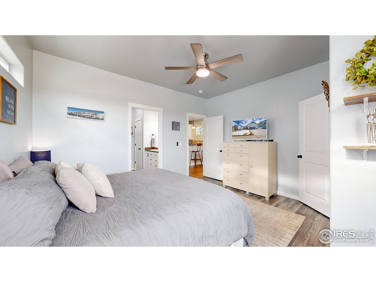 511 Wind River Drive Windsor, CO 80550 - Photo 14 of 22 a living room with furniture and a large window