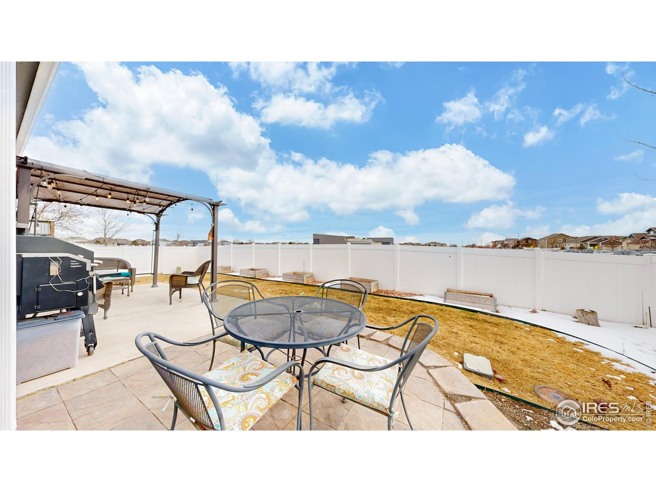 511 Wind River Drive Windsor, CO 80550 - Photo 17 of 22 a view of swimming pool with seating space and hardwood floor